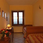 Farm Holidays La Baghera - La Baghera - Leporaia Apartment - Small Bedroom
